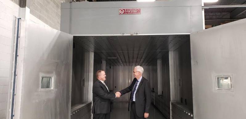 Capt. Rick Hepburn, USN (Ret), Hepburn and Sons LLC, tours the facility with TEFELEN America’s President/ CEO Philip Brown.