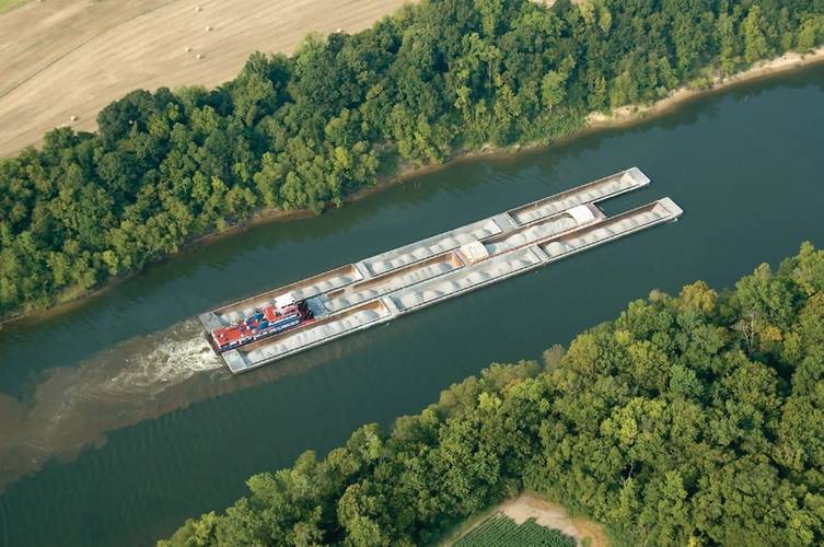 An inland pushboat and barges on the river / photo credit: Helm