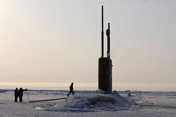 Los Angeles-class fast attack submarine USS Alexandria (SSN 757) is submerged after surfacing through two feet of drifting ice about 180 nautical miles off the north coast of Alaska. U.S. Navy photo by Shawn P. Eklund