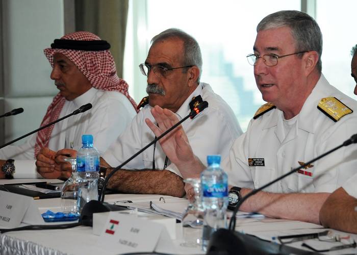 MANAMA, BAHRAIN (May 15, 2013) Vice Adm. John Miller, right, responds to a question during the senior leadership panel portion of the Maritime Infrastructure Protection Symposium. The symposium focuses on protecting the points of origin and destinations of shipping. (U.S. Navy photo by Mass Communication Specialist 1st Class Matthew R. White)