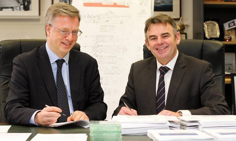 NERC chief operating officer Paul Fox and Cammell Laird CEO John Syvret seal the deal in Birkenhead on November 19 (Photo: Cammell Laird)