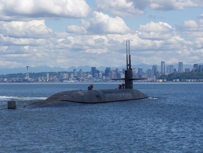 The Ohio-class ballistic-missile submarine USS Nebraska (SSBN 739) passes by Seattle on June 2 during sea trials after completing an extended major maintenance period at Puget Sound Naval Shipyard and Intermediate Maintenance Facility. (U.S. Navy photo by Joseph W. Weiser)