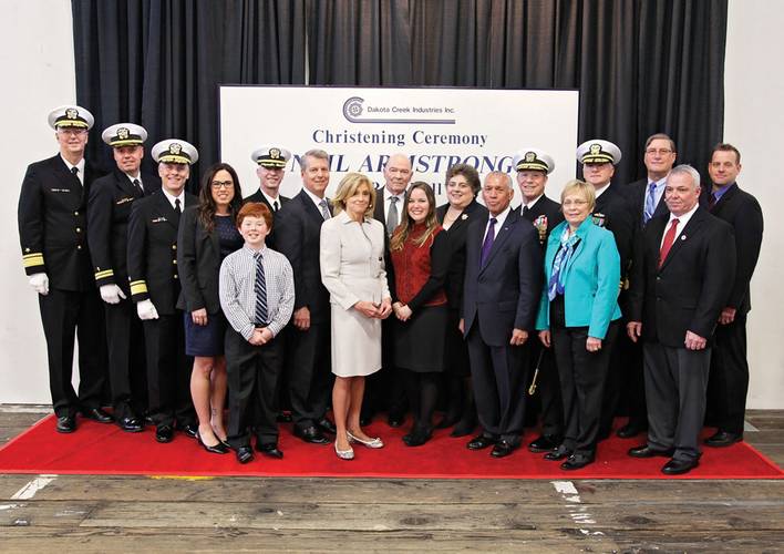Portrait of the dignitaries assembled for the christening of the R/V Neil Armstrong.  Guests from the US Navy, NOAA, NASA, Woods Hole, Dakota Creek Industries and Guido Perla Associates were on the dais along with members of the Armstrong family.(Courtesy of  Karla DeCamp, Dakota Creek Industries)