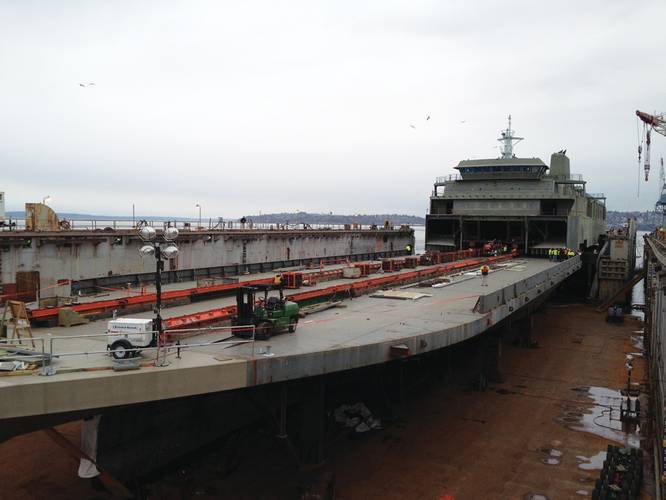 The process of installing the superstructure built by Nichols Brothers Boat Builders onto the hull of the M/V Tokitae at Vigor’s yard, March 2013.