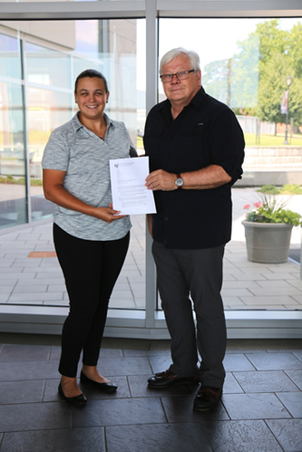 Rebecca Garcia-Malone, ASA Education Committee Chair, presents Dr. Richard J. Burke, ABS Professor of Naval Architecture & Engineering, SUNY Maritime College, with an official invitation to join the ASA as the very first honorary maritime faculty member representative, July 20, 2018 at SUNY Maritime College. (Photo: ASA)