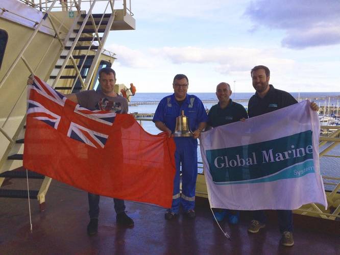 Re-flagging of the vessel from the Danish Marine Agency to the UK Marine Coastguard Agency. L-R: 2nd Officer, Maersk; Captain Flemming Bang, Maersk; Captain Richard Kearns, Master CS Recorder, Global Marine; and Rob Twell, Marine Manager for Global Marine (Photo: Global Marine Systems Limited)