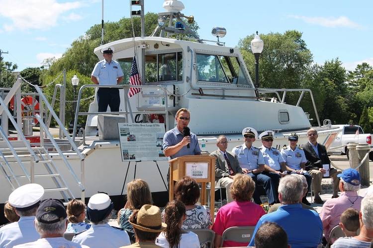 Ret. USCG Capt. Bob Desh, chairman of the Sturgeon Bay Coast Guard Committee, addresses an audience at the dedication ceremony for the last operational 41-foot utility boat. (USCG photo by Tom Morrell)