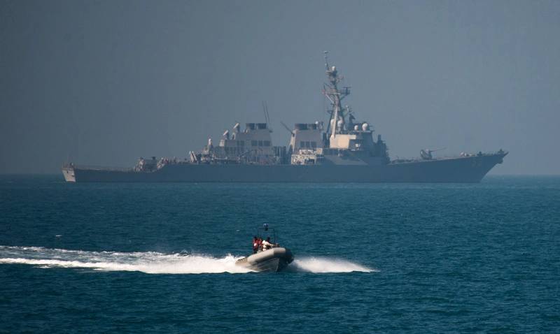 A ridged hull inflatable boat, launched from the Arleigh Burke-class guided-missile destroyer USS Russell (DDG 59), participates in a monthly Iraqi bilateral exercise. (U.S. Navy Combat Camera photo by Torrey W. Lee)