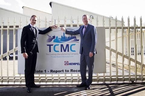 From left to right: Johann Geldenhuis and Kim Junge Andersen standing outside Hempel's first factory in Africa. (Photo: Hempel)