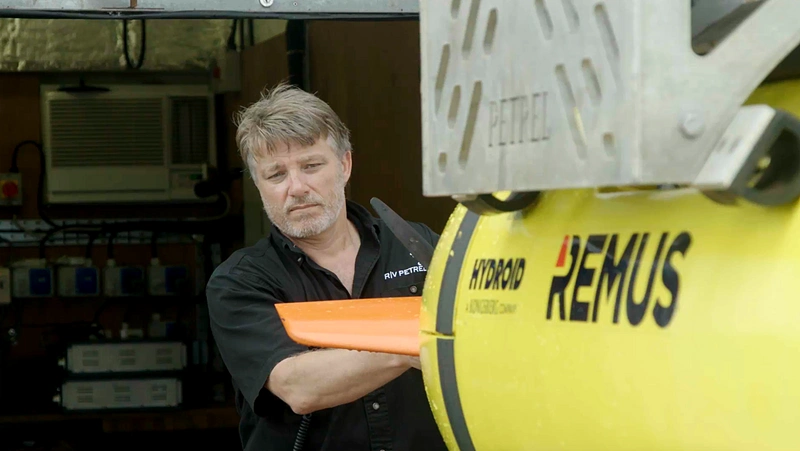 Robert Kraft, Director, Subsea Ops at Vulcan, prepares to deploy the AUV in search of the USS Indianapolis. (Photo courtesy of Paul G. Allen)