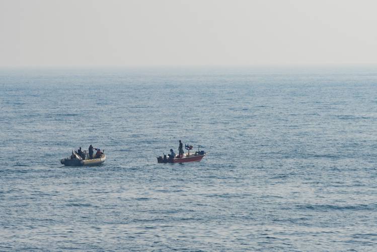 Sailors assigned to the guided-missile destroyer USS Nitze (DDG 94) render assistance to a distressed Iranian vessel. (U.S. Navy photo by Casey J. Hopkins)