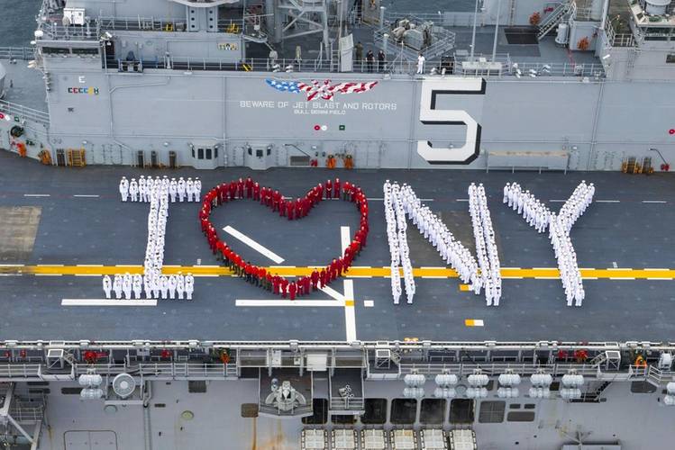 Sailors onboard USS Bataan (LHD 5) pose for a “I heart New York” photograph in preparation for Fleet Week New York. (U.S. Navy photo by Raymond Minami)