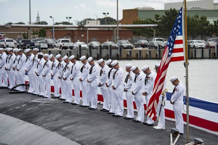 Sailors render a salute during the commissioning ceremony for the Virginia Class Submarine USS Washington (SSN 787) at Naval Station Norfolk. (U.S. Navy photo by Patrick T. Bauer)