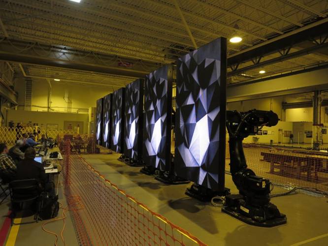 Six ABB RoboScreens attached to six industrial robots help Royal Caribbean boost onboard entertainment capacity (Photo: ABB)