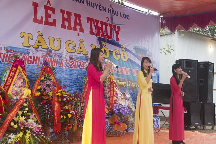 Songs to honor the new boat. The banner says, “Launching ceremony/ Wooden Fishing vessel/ In accordance with Decree 67/ NDCP by the Government/ 30 December 2015. (Haig-Brown photos courtesy of Cummins Marine)