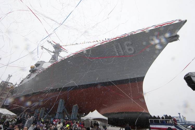 Streamers mix with snowfall following the successful christening of the future USS Thomas Hudner at Bath Iron Works in Maine Saturday, April 1, 2017. (Photo: General Dynamics)