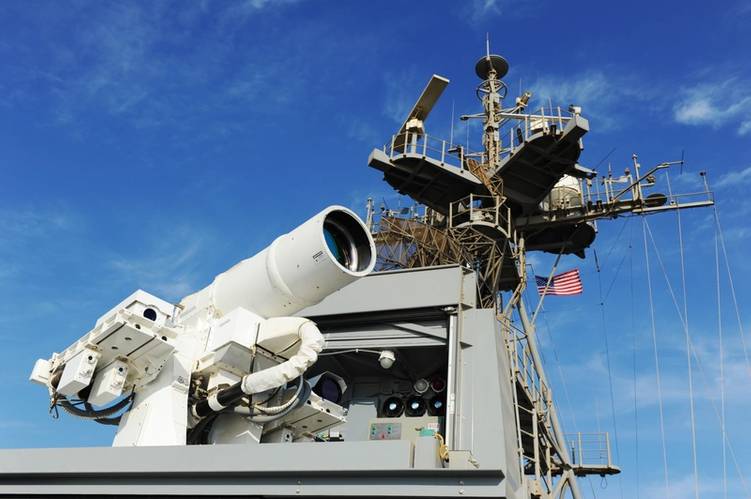 The Afloat Forward Staging Base (Interim) USS Ponce (ASB(I) 15) conducts an operational demonstration of the Office of Naval Research (ONR)-sponsored Laser Weapon System (LaWS) while deployed to the Arabian Gulf. (U.S. Navy photo by John F. Williams) Caption