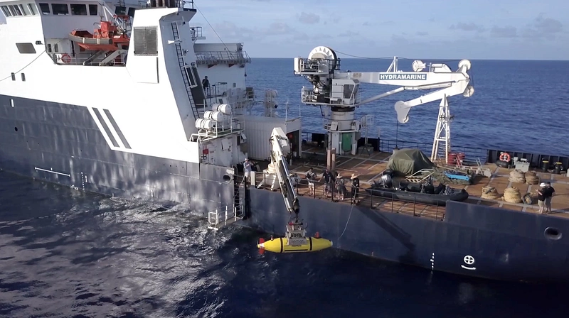 The AUV Hydroid Remus 6000 is deployed from the R/V Petrel in search of the USS Indianapolis. (Photo courtesy of Paul G. Allen)