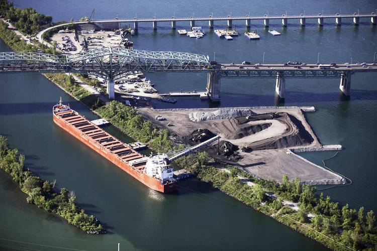 The Baie St. Paul discharges stone in August 2015 at the construction site of the new Champlain Bridge in Montreal. (Photo: Canada Steamship Lines/Mario Faubert)