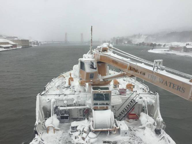 The Coast Guard Cutter Alder approaches the Portage Lake Lift Bridge in Houghton, Mich., Dec. 16, 2016. The Alder and other Great Lakes Coast Guard cutters commenced Operation Taconite, the Coast Guard’s largest domestic ice-breaking operation, encompassing Lake Superior, the St. Mary’s River, the Straits of Mackinac and Lake Michigan, Dec. 19, 2016. (U.S. Coast Guard photo)