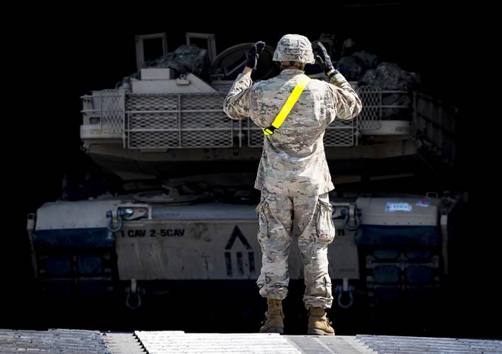 The Expeditionary Fast Transport has a large vehicle deck and stern ramp to carry heavy vehicles.  Here, a U.S. Army Soldier directs an M88A2 Hercules Recovery Vehicle down the stern ramp of the Spearhead-class expeditionary fast transport ship USNS Carson City (T-EPF 7) in Constanta, Romania. (U.S. Navy photo by Mass Communication Specialist 1st Class Kyle Steckler/Released)