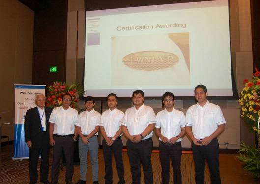 The first six Filipino staff of the WNI Manila Operations Center received Route Analyst badges from Captain Jiro Miyabe (Weathernews Vice President.)