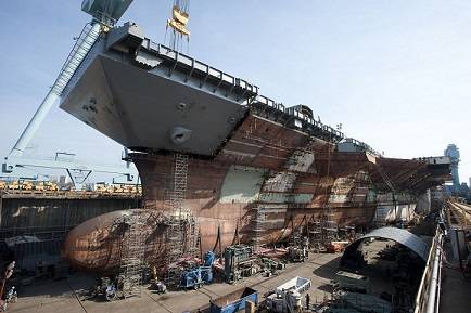 The flight deck of the aircraft carrier Gerald R. Ford (CVN 78) was completed on April 9, 2013, with the addition of the upper bow. The bow weighs 787 metric tons and brings Ford to 96 percent structural completion. Photo courtesy of Huntingdon Ingalls Industries.