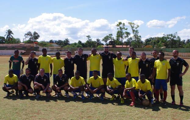 The Madagascan and Italian football teams line up together for a photo (Photo: EU NAVFOR)