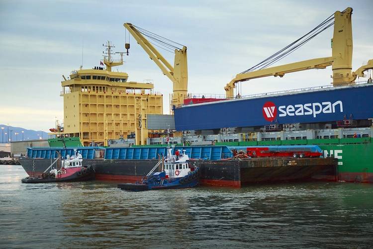 The main girder of Vancouver Shipyard’s new 300-metric-tonne Gantry Crane offloading at Fraser Surrey Docks on Saturday, February 15, 2014