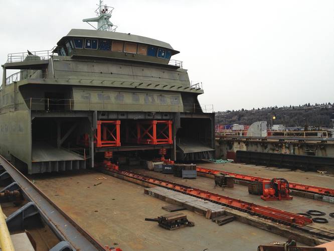 The process of installing the superstructure built by Nichols Brothers Boat Builders onto the hull of the M/V Tokitae at Vigor’s yard, March 2013.