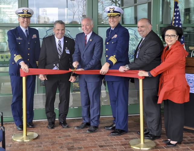 The ribbon is cut at the Coast Guard Science and Technology Innovation Center. Left to right: Capt. Dennis Evans, Mayor Michael Passero, U.S. Rep. Joe Courtney, Adm. Thomas Jones, Dr. Robert Griffin, Anh Duong (Coast Guard Photo by Corey J. Mendenhall)