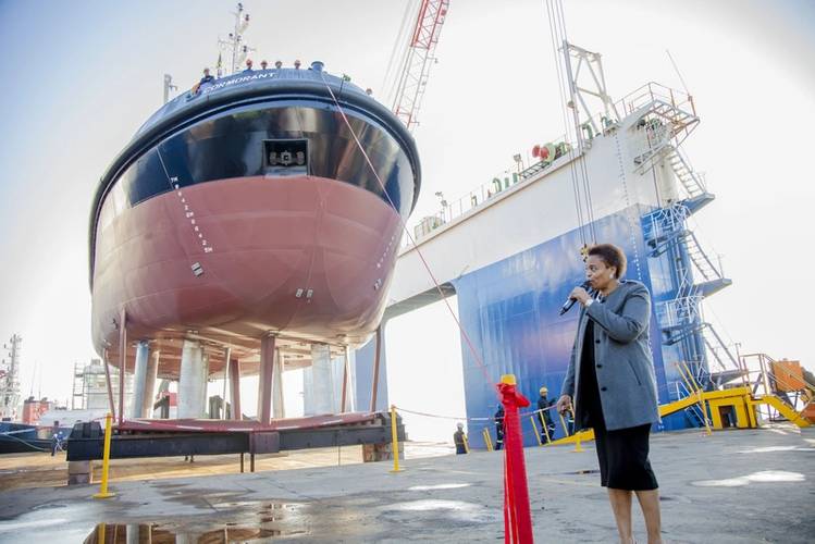 TNPA’s new tugs, Qunu and Cormorant, were launched and named at the Southern African Shipyards in Durban Linda Mabaso, Chair of Transnet SOC Limited, named the vessels, flanked by Trishna Misra, Chief Financial Officer of Southern African Shipyards. (Photo by Philip Wilson – Logico Creative Solutions)