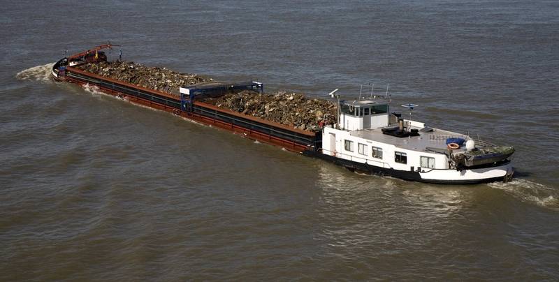 A typical inland pushboat working with a barge. (Courtesy: Helm)