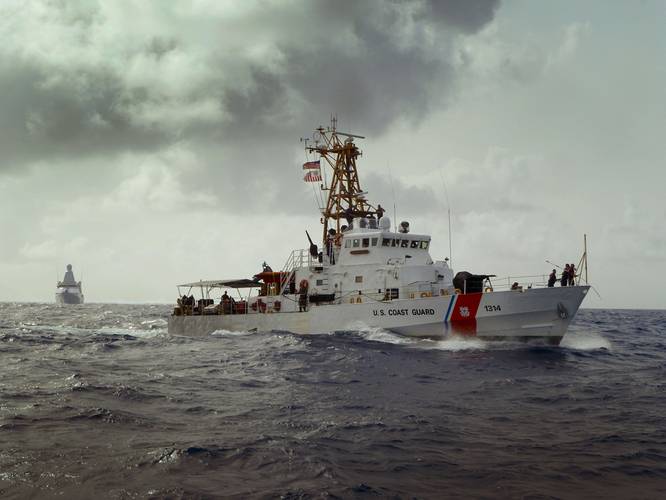 USCG Cutter Sapelo and the Royal Netherlands Navy Offshore Patrol Vessel HNLMS Holland search Caribbean Sea waters for bales of contraband jettisoned by Dominican drug smugglers.