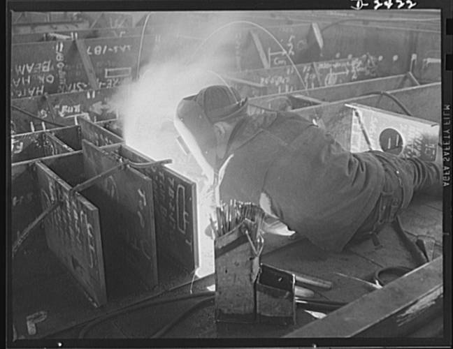 Welding is more important than ever  before in shipbuilding, saving time, weight and steel. (Photo Credit: Library of Congress)