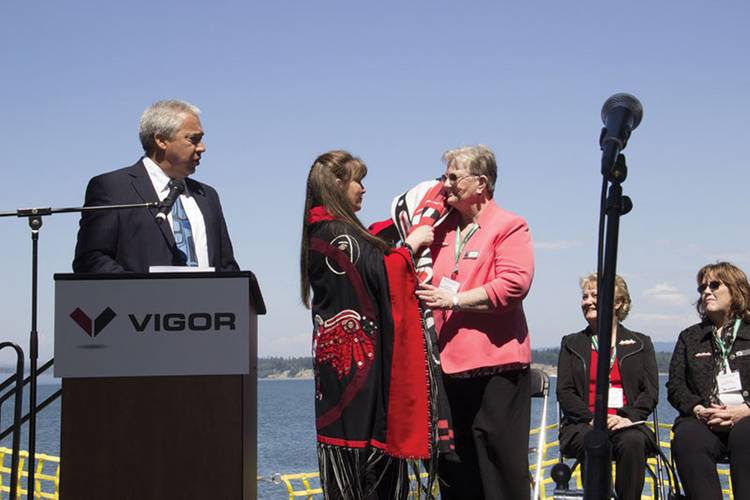 “Tom Wooten, Chairman of the Samish Indian Nation, and a tribal member present Assistant Director of Transportation for Ferries Lynne Griffith with a blanket at the dedication of the new ferry M/V Samish.”
