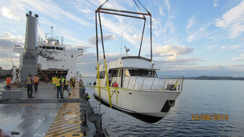 Yacht Being Loaded with Ship Raven