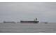 A bulk carrier ship was refloated Friday morning after running aground near Virginia Beach. (USCG photo)