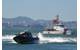 A Marine Safety and Security Team 91109 San Diego small boat and the Coast Guard Cutter Hawksbill conduct training in San Francisco Sept. 17, 2014. Credit: USCG Photo, Patrick Kelley, Photographer to the Commandant