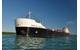 MV American Courage, a 194 metres Great Lakes self-unloading bulk freighter with a cargo carrying capacity of 24,300 gross tonnage, is the largest ship ever capable of performing automated docking and dock-to-dock sailing operations. © ASC-Rand Holdings LLC