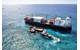 Ardent’s salvage crews work from their reconfigured sea base next to the Kea Trader, a stranded cargo vessel in New Caledonia. (Photo: Ardent)