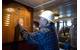 Briggs points to the names of commanding officers he served with through 1947-1950. (Photo: Jasmine Mieszala)