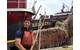 Cadet Joel Amendolara at McAllister’s Yard in Staten Island, alongside the bow of the tug RESOLUTE. Cadet Amendolara was aboard the tug for ten days.