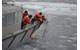Coast Guard Cutter Healy small boat crew members retrieve a National Oceanic and Atmospheric Administration small unmanned aircraft system after it landed in icy water. The SUAS was used to identify simulated spilled oil so that deployable recovery systems could be utilized. (U.S. Coast Guard photo by Petty Officer 3rd Class Grant DeVuyst)
