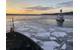 Coast Guard Cutter Penobscot Bay helps break free tug Stephanie Dann from the ice on the Hudson River near Kingston, N.Y. (U.S. Coast Guard photo by Steven Strohmaier, courtesy of Coast Guard Cutter Penobscot Bay)