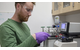 Collin Ward, a marine chemist at WHOI, works on polystyrene samples in his lab. Photo by Jayne Doucette, Woods Hole Oceanographic Institution