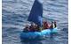Cuban migrants sail a rustic vessel south of Key West, Florida, Jan. 1, 2015. The Coast Guard Cutter Mohawk interdicted the 24 Cuban migrants and were later repatriated to Bahia de Cabañas, Cuba. (U.S. Coast Guard photo)