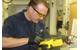 Cutter engineer receives immediate oil analysis results (Photo courtesy USCG)