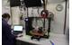 Ensign Abigail Isaacs uses a 3-D printer aboard Coast Guard Cutter Healy (U.S. Coast Guard photo)