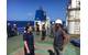 Ensign Samantha Penate, from the Coast Guard Cutter Confidence, speaks with the master of Alta to determine the situation aboard their disabled cargo ship in the Atlantic Ocean, October 7, 2018. The ship became disabled more than 1,000 miles from shore on September 19. U.S. (Coast Guard photo by Todd Behney)